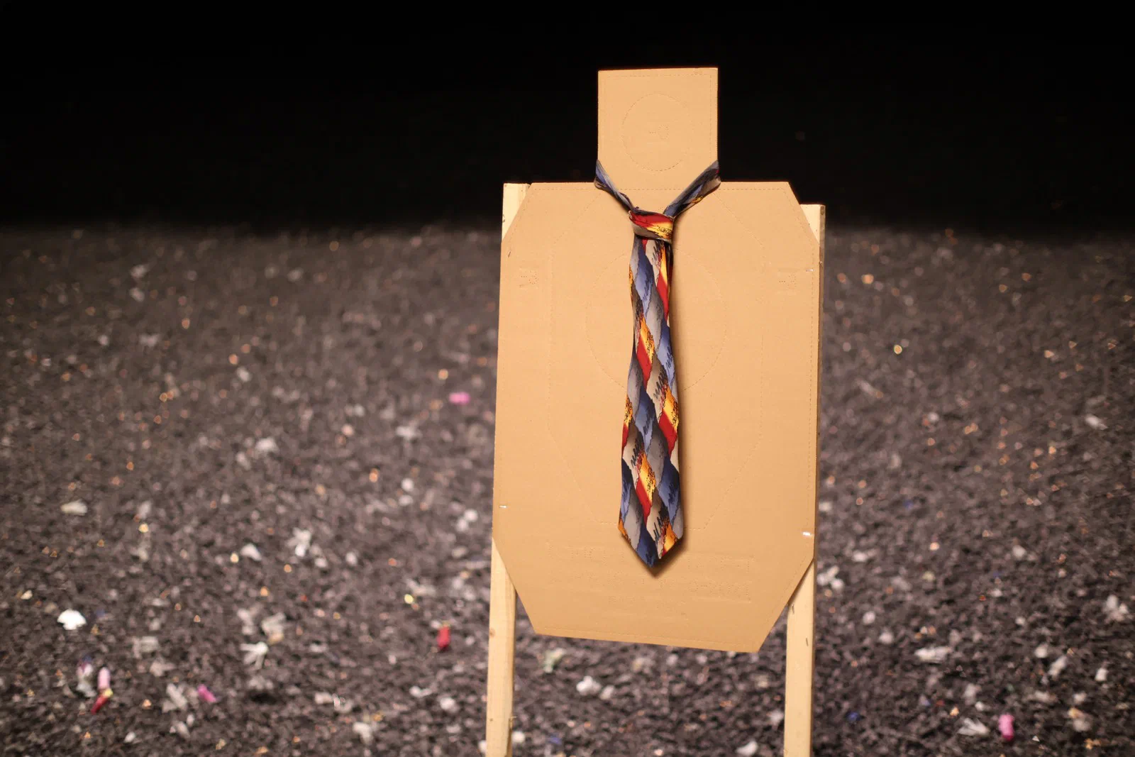 A cardboard target wearing a necktie